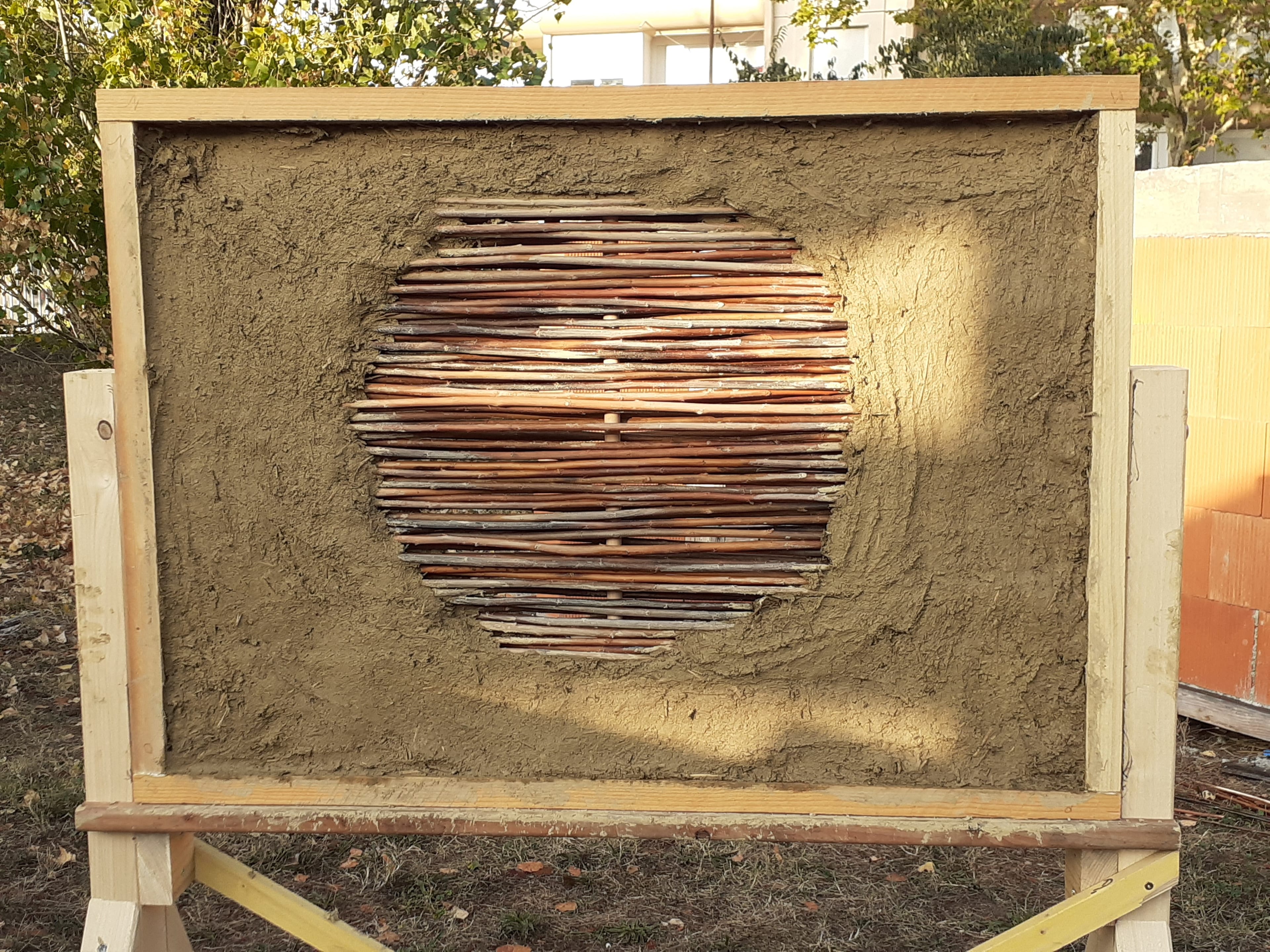 Panneau en terre et fibres