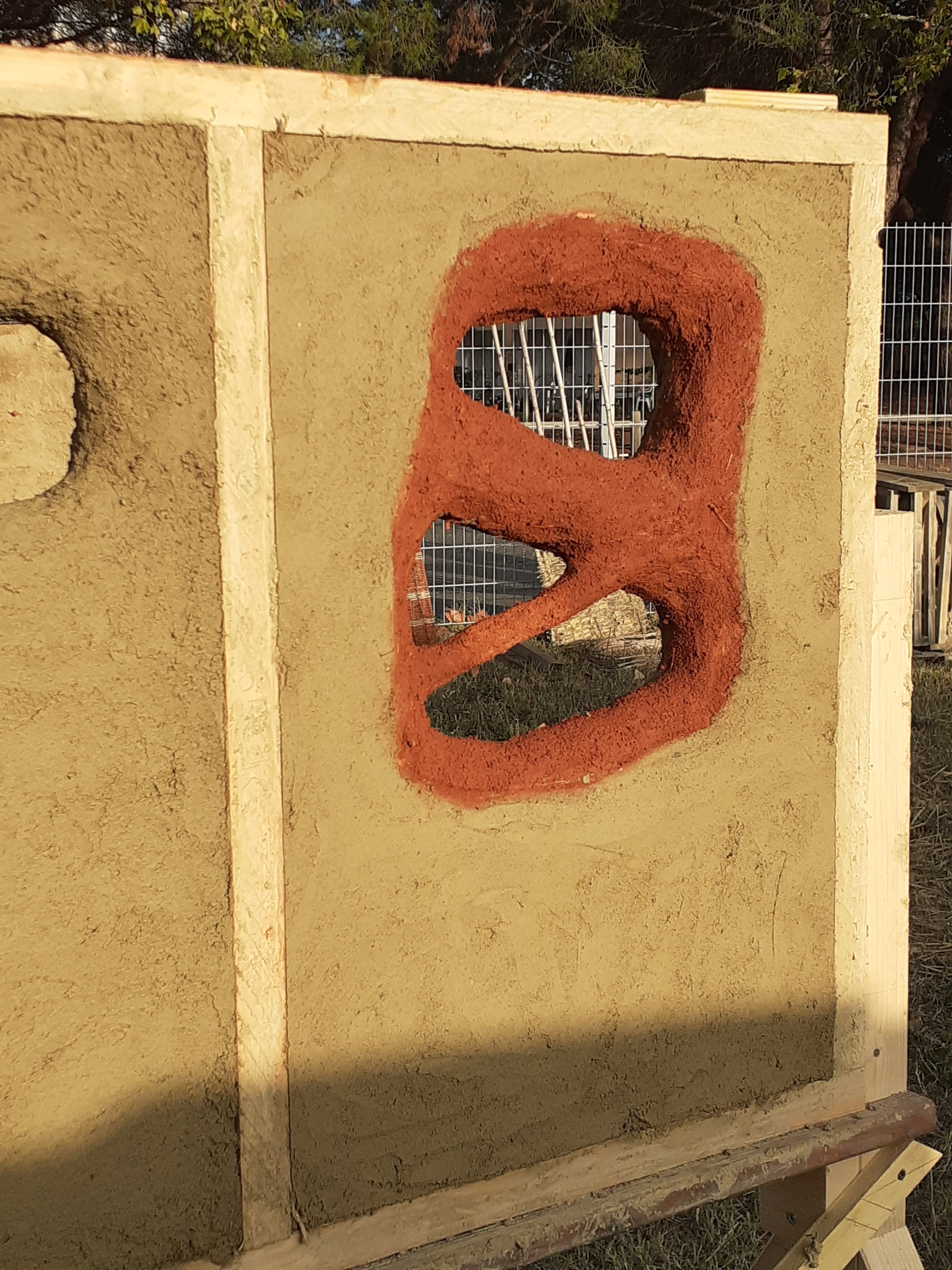 Panneau de construction en terre